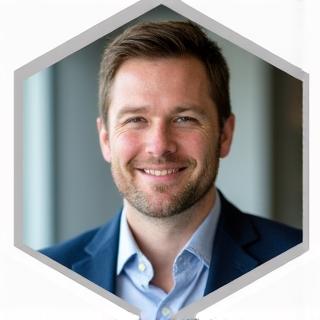 Professional headshot of Ben Carter.